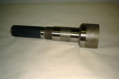 A progressive cavity pump drive shaft with a plasma sprayed ceramic section.